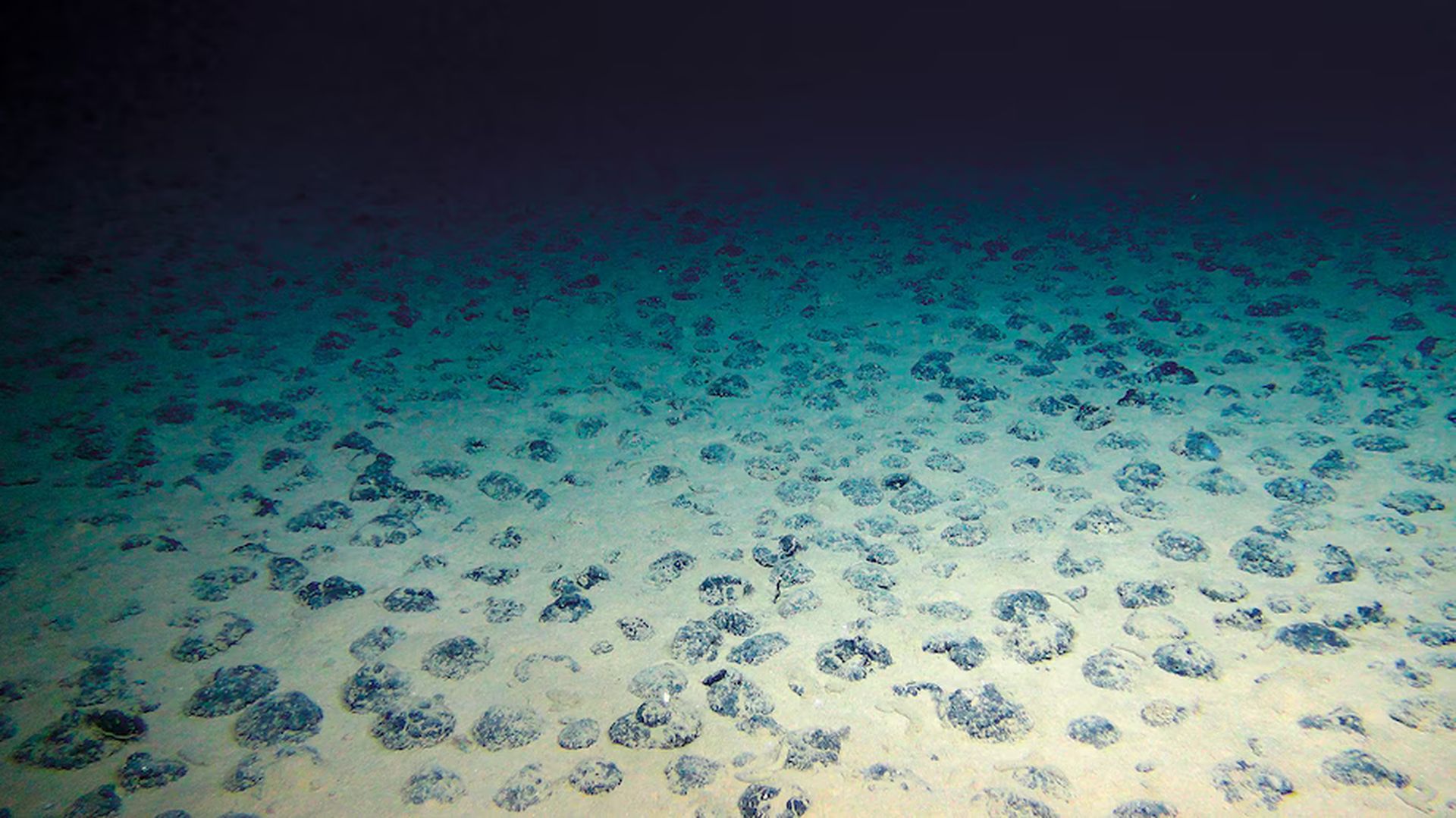 Explore the groundbreaking discovery of deep ocean dark oxygen: how underwater nodules create oxygen without sunlight?