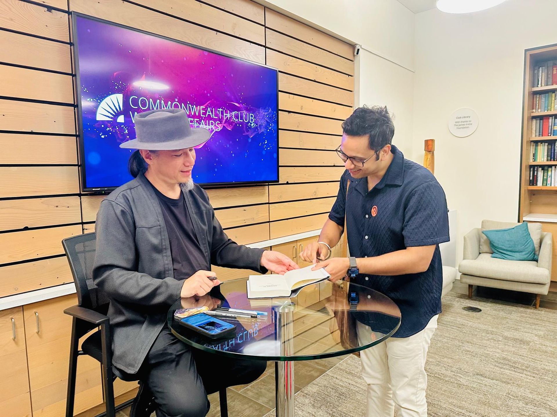 Satish with Professor De Kai at an event