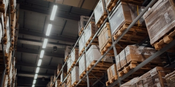 What causes warehouse bottlenecks during rapid growth